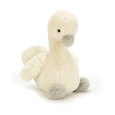 Plush toy swan on a white background