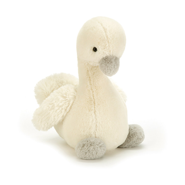 Plush toy swan on a white background